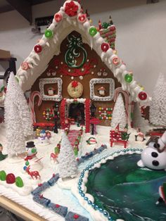 a gingerbread house decorated with christmas decorations