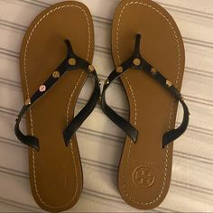 Tory Burch Ricki Flip Flop Never Worn Gold Hardware Nwot Adjustable Tan Sandals For Vacation, Tan Toe Post Sandals For Beach, Casual Tan Flip Flops For The Beach, Tan Flat Flip Flops For Vacation, Tan Open Toe Flip Flops For The Beach, Tan Vacation Flip Flops, Flip Flop, Flip Flop Sandals, Women's Shoes Sandals