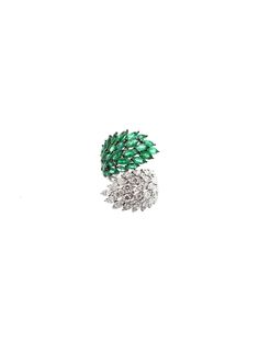 With a classic look inspired by nature. This ring features 3.80ct in emeralds and 2.30ct. t.w. diamonds. Set in 18K White Gold. 18K Gold: 9.00gr Diamonds: 2.30ct Clarity: VS1 - SI1 Color: G - H Emeralds: 4.40ct Dimension: 21mm x 31mm Size: 7 Available in White Gold With natural inclusions, untreated gemstones Contact us to further customize SKU: RI0992 Luxury Green Emerald Ring With Baguette Diamonds, Luxury Green Rings With Baguette Diamonds, Green Cluster Luxury Ring, Bypass Ring, Jewelry Website, Inspired By Nature, Precious Metals, Nature Inspiration, 18k Gold