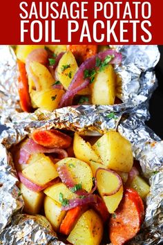 two foil packets filled with potatoes and carrots