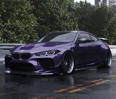 a purple sports car parked in the rain