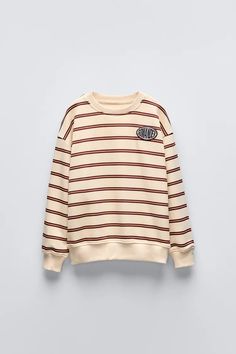 STRIPED SWEATSHIRT WITH PATCH - Striped | ZARA United States Striped Sweatshirt, Waistcoat Dress, Flat Lays, Striped Sweatshirts, Boys Sweatshirts, Cardigan Sweater Dress, Cardigan Sweater Jacket, Round Neck Sweatshirts, Leather Shirt