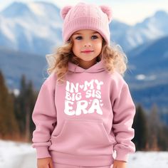 "This cozy hooded crewneck is the perfect gift for a big sister or big brother (to be). Featuring the saying \"In my big sister era\" or \"in my big brother era\" in bold letters on the front, this shirt is super cute all year wear. 𝐇𝐎𝐖 𝐓𝐎 𝐎𝐑𝐃𝐄𝐑 1. Select the size & color when applicable 2. Add the personalization (name, design etc) when required 3. Add to Cart & submit your order. 4. If ordered over $35, we have FREE shipping for you! 𝐀𝐋𝐖𝐀𝐘𝐒 𝐇𝐀𝐍𝐃𝐌𝐀𝐃𝐄 * Each item is handmade and made to order here in Florida! * We carry several different brands and use different brands for different listings, including Rabbit Skins®, Gildan®, Gerber Onesie®, Bella Canvas® and Comfort Colors®. G A R M E N T ∙ F E A T U R E S : * Unisex Fit * Commercial grade heat press S H I P P I N Casual Hoodie With Name Print For Winter, Casual Winter Hoodie With Name Print, Winter Hoodie With Name Print, Family Matching Long Sleeve Hoodie With Letter Print, Big Sister Announcement Shirt, Big Brother To Be, Big Sister Announcement, Big Sister Shirt, Clothing Mockup