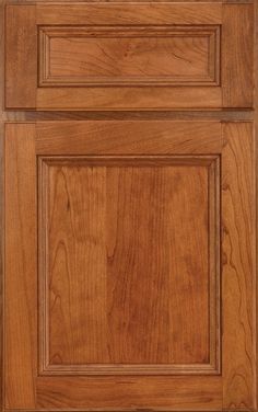 a close up view of the front and side panels of a kitchen cabinet door with wood grain