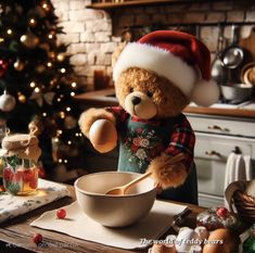 a teddy bear wearing a santa hat is mixing something in a bowl with a spoon