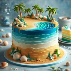 there is a cake that has been decorated with shells and palm trees on the beach