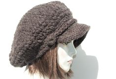 "Style: classic slouchy newsboy hat. It has a solid double-layer brim and a strap with button. Material: a mix of yarns of different structure and color. 10% wool, 10% mohair, 80% acrylic Color: red color hat on this auction but you will find other color options on my auctions. https://www.etsy.com/shop/GreenCatStudio?ref=seller-platform-mcnav&section_id=14355600 Characteristics hat:chunky,soft,warm,cozy,unique Size: Hat Circumference: 22\" - 23\" Hat Height: 10\" You can also buy a hat with Warm Slouchy Solid Color Hat, Slouchy Hats For Cold Weather, Slouchy Solid Knitted Hats, Slouchy Knitted Solid Color Hat, Solid Color Slouchy Knitted Hat, Slouchy Brimmed Beanie For Fall, Knitted Slouchy Hat, Casual Slouchy Brown Hat, Slouchy Yarn Cap