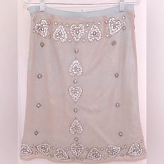 Nwt Tracy Reese Skirt Crystal Embellished Mesh Over Silk Floral Underskirt Crystal Embellished Heart Motif Nude Mesh Outer Skirt Aqua Silk Over Skirt Contrasting Waistband Hidden Side Zipper Tags Intact Replace Crystals/Beads Included Flat Measurements: Waist- 14.5” Length- 23” Nwt Gorgeous Condition - New With Tags - Never Worn Pet Free. Smoke Free. Elegant Embellished Bottoms For Festive Occasions, Elegant Festive Embellished Bottoms, Embellished Mini Skirt For Summer, Summer Embellished Mini Skirt, Fitted Embellished Summer Skirt, Fitted Embellished Pencil Skirt, Embellished Fitted Pencil Skirt, Glamorous Embellished Mini Skirt For Cocktail, Glamorous Embellished Bottoms For Wedding