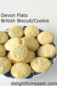 a blue and white plate filled with cookies