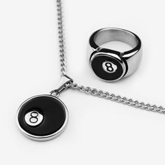 8 BALL BUNDLE IN SILVER PLATED STAINLESS STEEL Water/sweat/heat resistant (no green skin) Includes: 8 ball ring + 50cm long micro cuban chain + 20mm x 20mm 8 ball pendant We make our rings + pendants following our sustainable ethos. Up to 60% of the stainless steel we use has been recycled from other sources, and it can be fully recycled again to make new products in the future. 8 Ball Ring, 8ball Ring, Outfits Baggy, Green Skin, 8 Ball, Vintage Clothing Online, Ball Pendant, Jewelry Lookbook, Cuban Chain