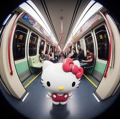 an image of a hello kitty on the subway