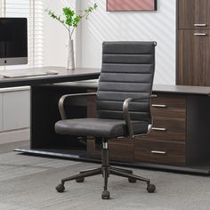 an office chair sitting in front of a desk