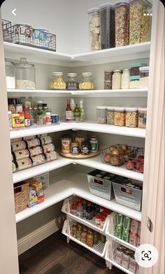 an organized pantry with lots of food in it