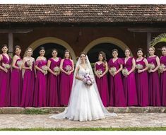 a bride and her bridal party posing for a photo