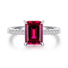 Crafted with meticulous precision, this ring showcases the deep red beauty of the lab-grown ruby, symbolizing love and passion. The vibrant hue of the ruby captures attention and adds a touch of drama to the design. The side stones, carefully selected to complement the ruby, enhance its brilliance and create a mesmerizing display of light. The elegant setting ensures that the gemstones are securely held while allowing maximum light to pass through, enhancing their fiery glow. Whether it's a roma Fine Jewelry Lab-created Ruby Ring For Valentine's Day, Valentine's Day Lab-created Ruby Fine Jewelry Ring, Valentine's Day Fine Jewelry Lab-created Ruby Ring, Lab-created Ruby Ring For Valentine's Day, Luxury Lab-created Ruby Ring With Halo Setting, White Gold Ruby Birthstone Ring, Classic Ring With Prong-set Lab-created Ruby, White Gold Ruby Ring With Brilliant Cut Lab-created Ruby, Classic Solitaire Jewelry With Lab-created Ruby