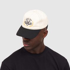 Handcrafted from premium cotton twill, this cap features a classic five-panel design with contrast stitching, peak, and Yacht Club crest. Unlike any cap you've worn before, its thicker, reinforced front panel maintains its shape, while the softer back ensures unmatched comfort. With a pre-curved bill, metal hardware, and adjustable back strap, this limited edition piece sets a new standard for how wearing a cap should feel. Handmade with 100% cotton twill Classic Five-panel design Contrasting Ya Cotton 5-panel Hat For Streetwear, Cream Cotton Snapback Baseball Cap, Vintage Canvas Baseball Cap With Curved Brim, Canvas Snapback Baseball Cap For Streetwear, Cream Cotton Hat For Streetwear, 5-panel Baseball Cap For Streetwear, Embroidered Logo 5-panel Baseball Cap For Baseball Season, White Cotton 5-panel Dad Hat, White 5-panel Cotton Dad Hat