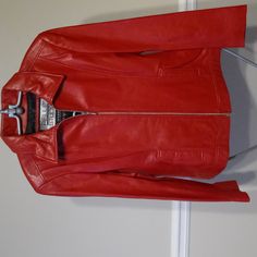 Pelle Studio Wilsons Leather Soft Red Zippered % Leather Jacket Nwot Red Leather Outerwear For Work, Red Leather Jacket With Zipper For Work, Red Leather Jacket With Button Closure For Work, Spring Red Leather Jacket, Fitted Red Leather Jacket, Casual Red Leather Jacket With Zipper Closure, Classic Red Leather Outerwear, Red Fitted Leather Jacket With Pockets, Red Fitted Leather Biker Jacket