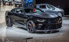 the chevrolet camaro is on display at an auto show