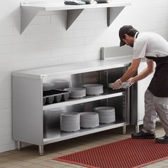 Keep your dishes, flatware, and glassware hidden and out of harm's way with this Regency 18" x 60" stainless steel dish cabinet. Constructed of 18 gauge type 304 stainless steel, this cabinet is built tough to withstand the wear and tear of a busy commercial kitchen. The 60" long top provides an ample amount of space for staging clean plates and other tableware that is ready for table service, while the shallow 18" width takes up minimal walking space in the kitchen.  An adjustable shelf can be Vineyard Kitchen, Kitchen Equipment Storage, Restaurant Cabinet, Kitchen Cutlery Storage, Restaurant Kitchen Equipment, Dish Cabinet, Steel Restaurant, Kitchen Cupboard Designs, Cutlery Storage