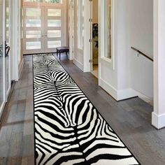 a zebra print rug is on the floor