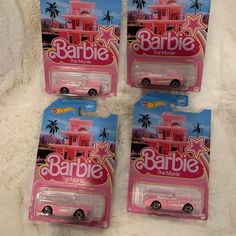 three pink barbie cars in the packaging for barbie's new movie, barbie the movie