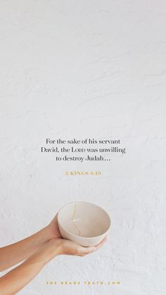 a woman holding a bowl with the quote for the sake of his servants david, the lord was unwilling to destroy him