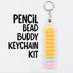 a keychain made out of beads with the words pencil bead buddy keychain kit