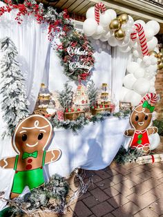 an outdoor christmas party with gingerbreads and decorations