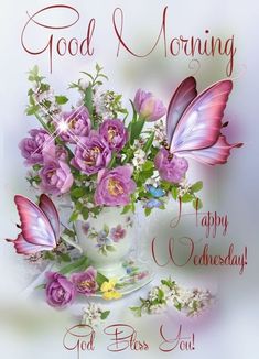 a vase filled with purple flowers and butterflies on top of a white table next to the words good morning