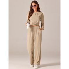 Fashion Style: Long Sleeve Crop Tops/Round Neck/Solid Color/Ribbed Knit/Wide Leg Pant/Tracksuit Lounge Sets. Perfect for both day and evening occasions, these blouses add a touch of elegance and style to any wardrobe. The twist front long sleeve top looks stylish and can be worn separately from the wide leg sweatpants. This lounge tracksuit is ideal for casual street looks, leisure at home, workouts, running, weekends, vacations, and beach outings. Made of 95% Polyester and 5% Spandex, it offers Long Sleeve Pant Set In Solid Color, Solid Long Sleeve Pant Set, Solid Color Long Sleeve Matching Pant Set, Two-piece Long Sleeve Loungewear Pant Set, Two-piece Long Sleeve Pant Set For Loungewear, Matching Set For Loungewear - Fall Season, Matching Loungewear Sets For Fall, Matching Set Loungewear For Fall, Solid Color Pant Set For Fall Loungewear