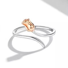 Product Description Roses bloom all year round! This sterling silver ring features a shiny dimensional rosebud ready to bloom! A slim flat-edged band creates the stem for this rich rose gold rosebud, giving it a graceful shape as it hugs any finger. Celebrate your romance with this pretty ring, or gift it to yourself and enjoy luxury any time. Features Material: Sterling Silver Nickel-Free Hyperallergic High-Polish Finish Size: adjustable FAST Shipping from FL, USA Silver Rose Ring, Silver Wrap Ring, Silver Flower Ring, Rose Ring, Gift Message, Pretty Rings, Wrap Rings, Open Ring, Silver Flowers