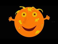 an orange with stars on it's face and arms is smiling at the camera