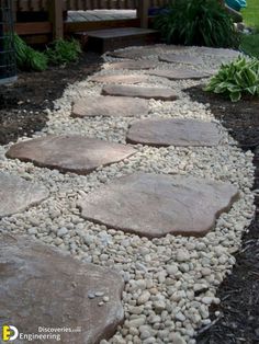 a garden path made out of rocks and gravel