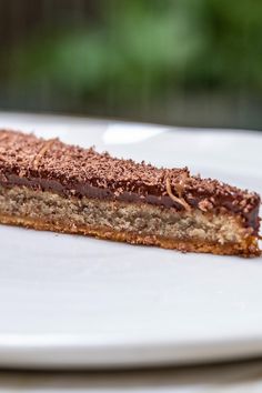 a piece of cake sitting on top of a white plate