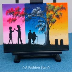 an easel with three paintings of people holding hands in front of a tree and fence