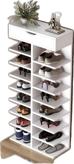 a white shoe rack with many pairs of shoes on top of it and a potted plant in the middle