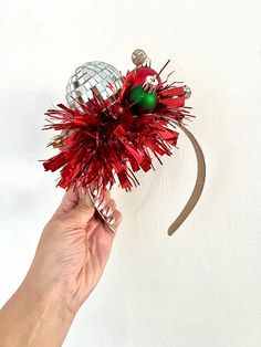 🎄XL adult Christmas tinsel headband fascinator  🎄These Alice bands are lightweight and comfy to wear. With a large sparkling silver disco ball, red festive tinsel and red, green and gold baubles on the side. 🎄These fun Christmas headbands are great for making a big statement over the festive season!  🎄Add with your favourite Christmas jumper or on its own, it's a great timeless statement piece that you can wear year after year.   🎄Best suited for adults due to the size  Lots of other styles and colours available in the Etsy shop. Novelty Christmas Party Headband, Red Headband For Carnival Party, Carnival Red Party Headband, Novelty Red Headband For Party, Red Novelty Headband For Party, Red Carnival Party Supplies, Tinsel Headband, Gold Baubles, Silver Disco Ball