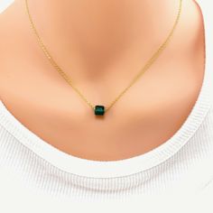 Our Crystal Emerald Cube Birthstone Necklace is an effortlessly gorgeous and minimalist necklace that will become a daily staple. Personalize it with as a birthstone of your loved one, or your own. Whether you are gifting for a thoughtful birthday or baby shower present, this personalized necklace will be loved by the lucky recipient. Made with a Swarovski crystal cube on 14k gold filled chain with a 14k gold lobster clasp to ensure a secure closure. 14k gold chain 14k gold lobster clasp 6 mm Sw Emerald Crystal, Cube Necklace, 14k Gold Necklace, Chain Extenders, Green Emerald, Jewelry Companies, Minimalist Necklace, Birthstone Necklace, Personalized Necklace