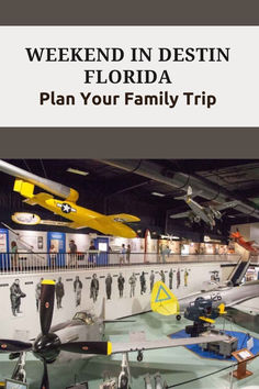 an airplane museum with planes hanging from the ceiling