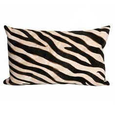 a black and white zebra print pillow on a white background