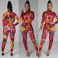 Stretch Jumpsuit Long Sleeve Reversible Zipper Closure Mock Neck 82% Polyester 18% Spandex Model Is Wearing A Size Small Model Stats Height: 5.5" Bust:34" / Waist:27" / Hips:42" Trendy Stretch Unitard For Spring, Trendy Spring Stretch Unitard, Multicolor Printed Stretch Jumpsuits And Rompers, Fitted Multicolor Printed Jumpsuits And Rompers, Stretch Multicolor Unitard, Fitted Multicolor One-piece Jumpsuit, Alisha Berry, Cheap Multicolor Stretch Jumpsuit/romper, Jumpsuit Long Sleeve