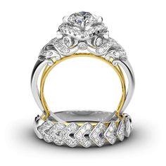 two tone gold and silver wedding ring set with diamonds on the sides, featuring an oval center