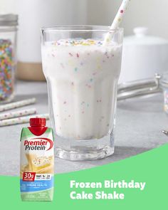 a frozen birthday cake shake with sprinkles and a bottle of ice cream