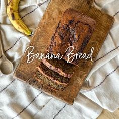 a banana bread sitting on top of a cutting board