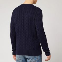 This Polo Ralph Lauren navy cable knit jumper boasts an embroidered polo logo on the chest. Crafted from a thick cotton yarn, it is completed with ribbed trims on the neck, cuffs, and hem. Ralph Lauren Cable Knit, 1/4 Zip Sweater, Polo Logo, Fleece Quarter Zip, Cotton Jumper, Cable Knit Jumper, Long Sleeve Jumper, Knit Long Sleeve, Quarter Zip Pullover