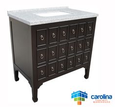 an image of a bathroom vanity with marble counter top and drawers in dark brown finish