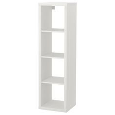 a white book shelf with three shelves on each side