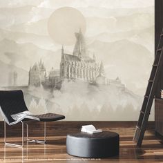 a living room with a chair and wall mural