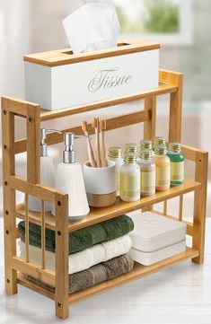 a wooden shelf filled with lots of bathroom items