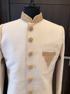 Cream Sherwani With Chikankari Embroidery And Long Sleeves, Cream Long Sleeve Sherwani With Chikankari Embroidery, Cream Kurta With Resham Embroidery For Groom, Bandhgala With Chikankari Embroidery For Groom At Festivals, Groom's Eid Sherwani With Chikankari Embroidery, Festive Bandhgala With Chikankari Embroidery For Groom, Long Sleeve Bandhgala With Chikankari Embroidery For Groom, Groom's Traditional Wear With Chikankari Embroidery, Traditional Cream Nehru Jacket For Groom